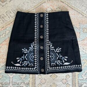 Black skirt with light blue details. Anthropology. Size M.